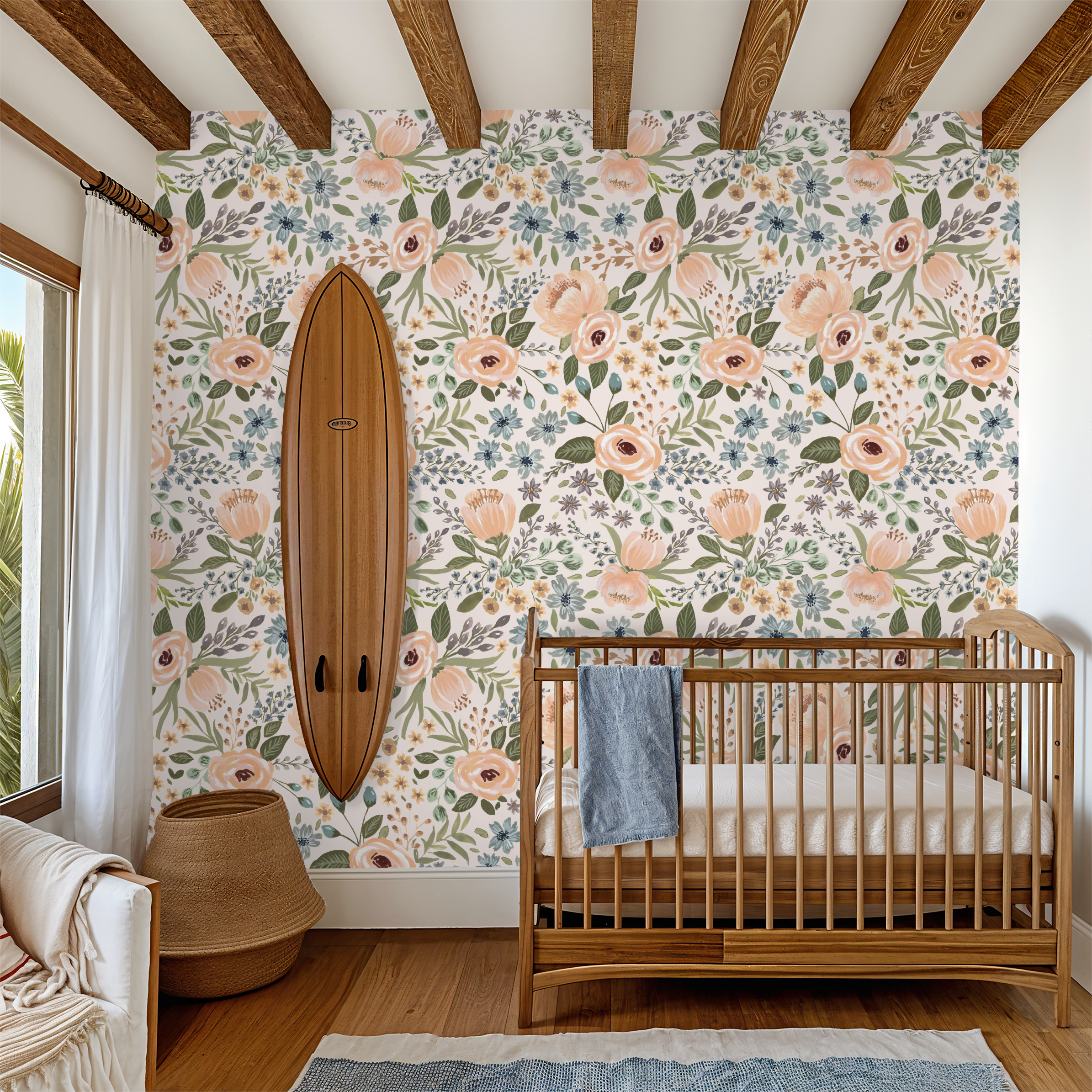 Nursery room with floral wallpaper, wooden crib, and surfboard against the wall.