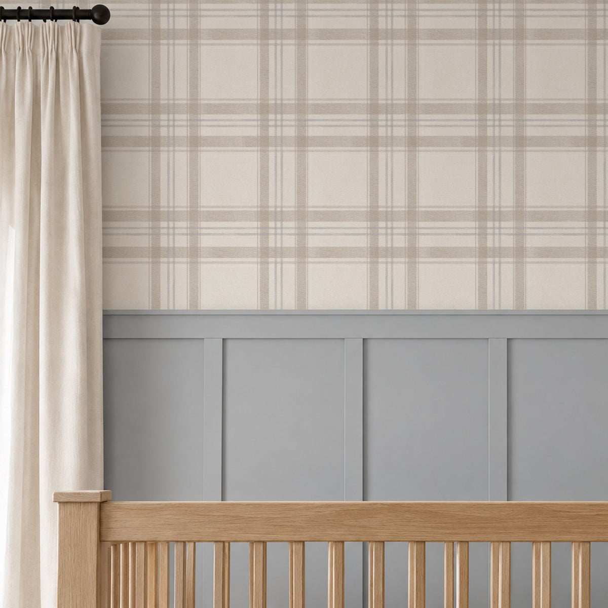 London Plaid wallpaper in soft taupe, oatmeal and faded blue above grey wainscoting in a neutral nursery with a natural wood crib