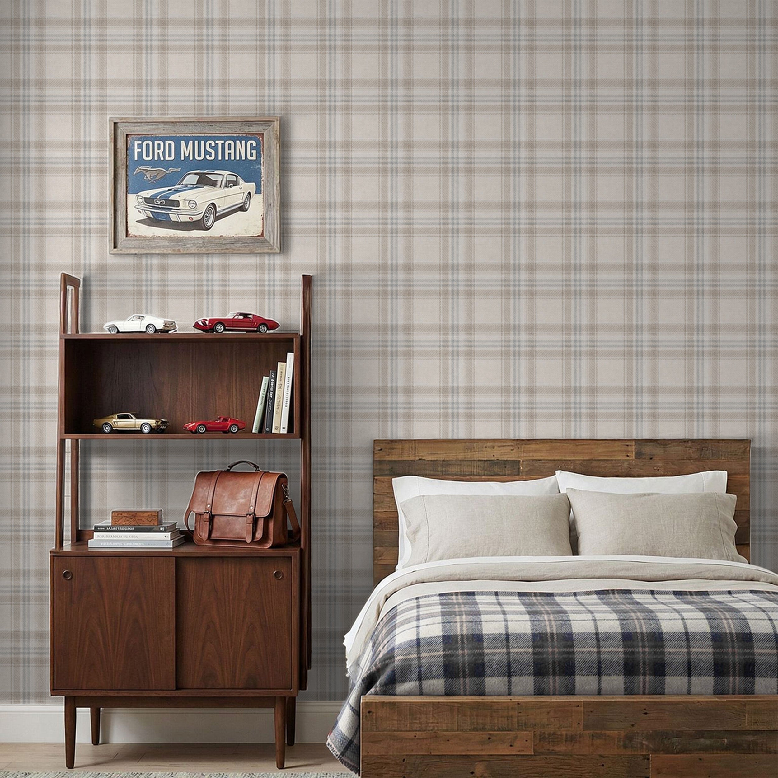 Neutral plaid wallpaper in a cozy bedroom with warm wood furniture and layered bedding.