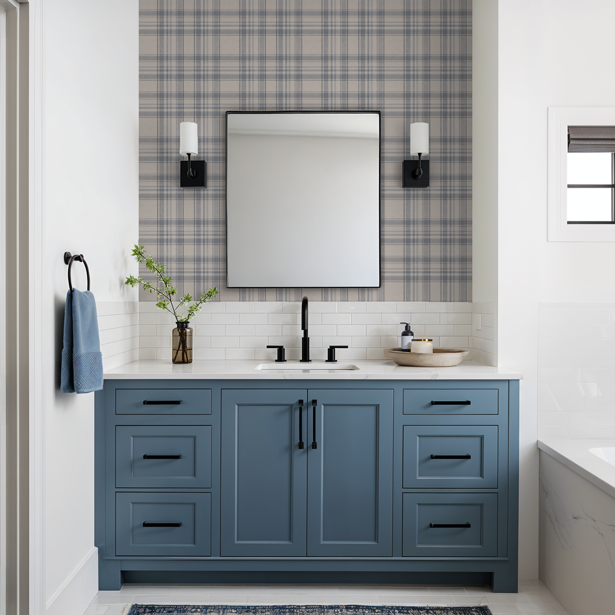 Navy blue plaid wallpaper in bathroom with classic tartan pattern, tailored blue wall design with woven texture effect.