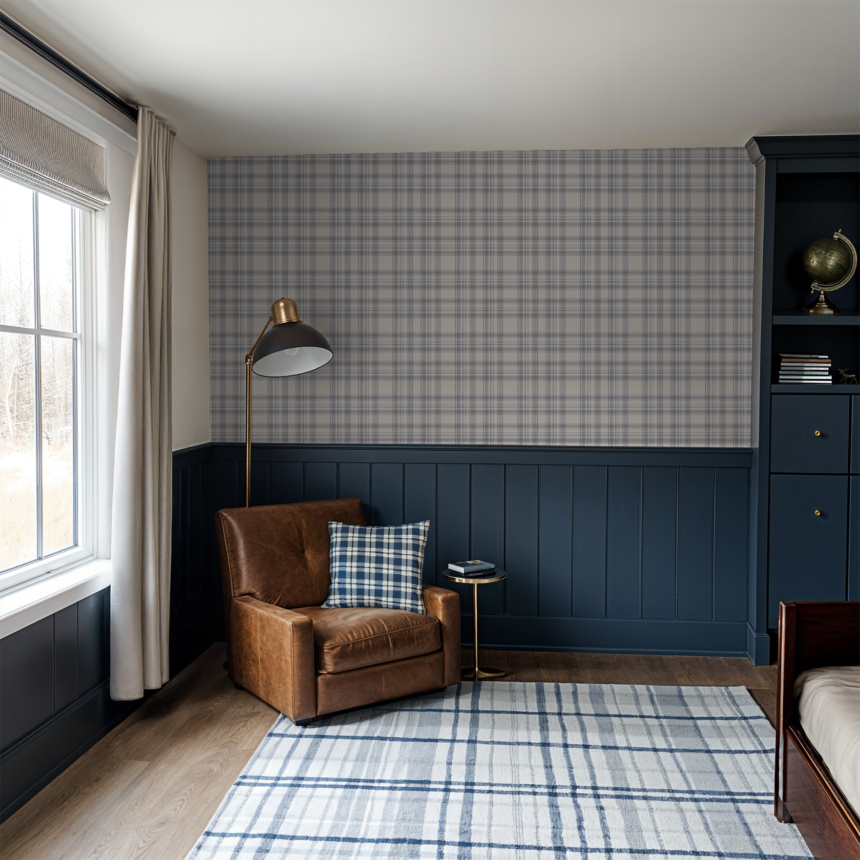 Cozy room with Tweed Plaid - Navy Blues wallpaper, brown leather armchair, and checkered rug.