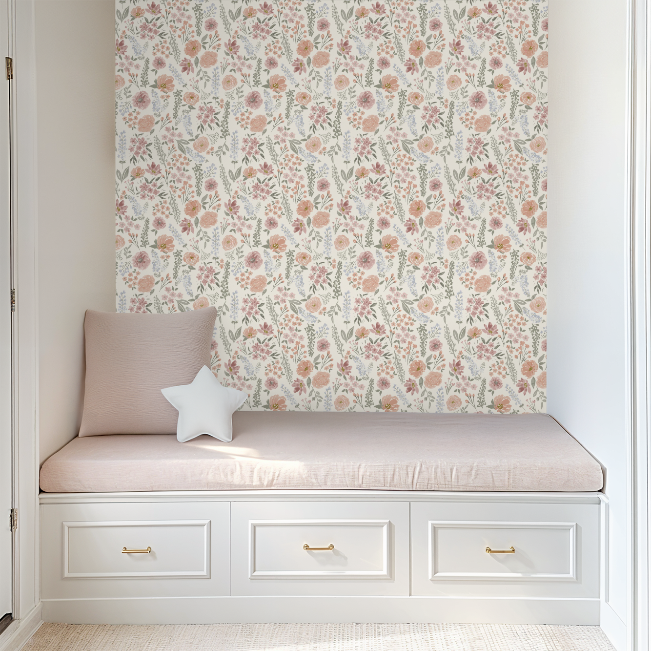 Window seat with floral wallpaper and a star-shaped pillow