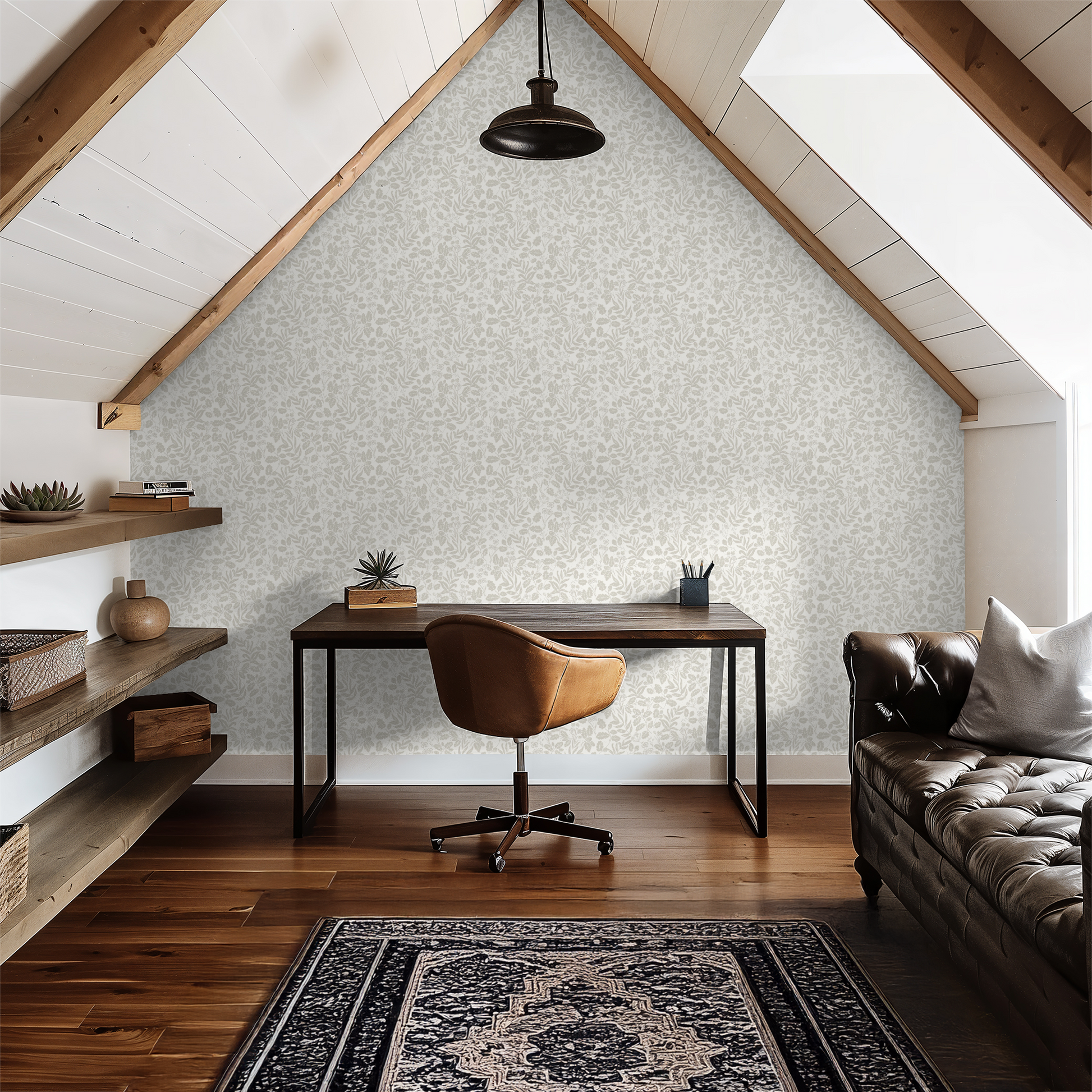 Home office with wooden desk, leather chair, and shelves against a patterned wall.