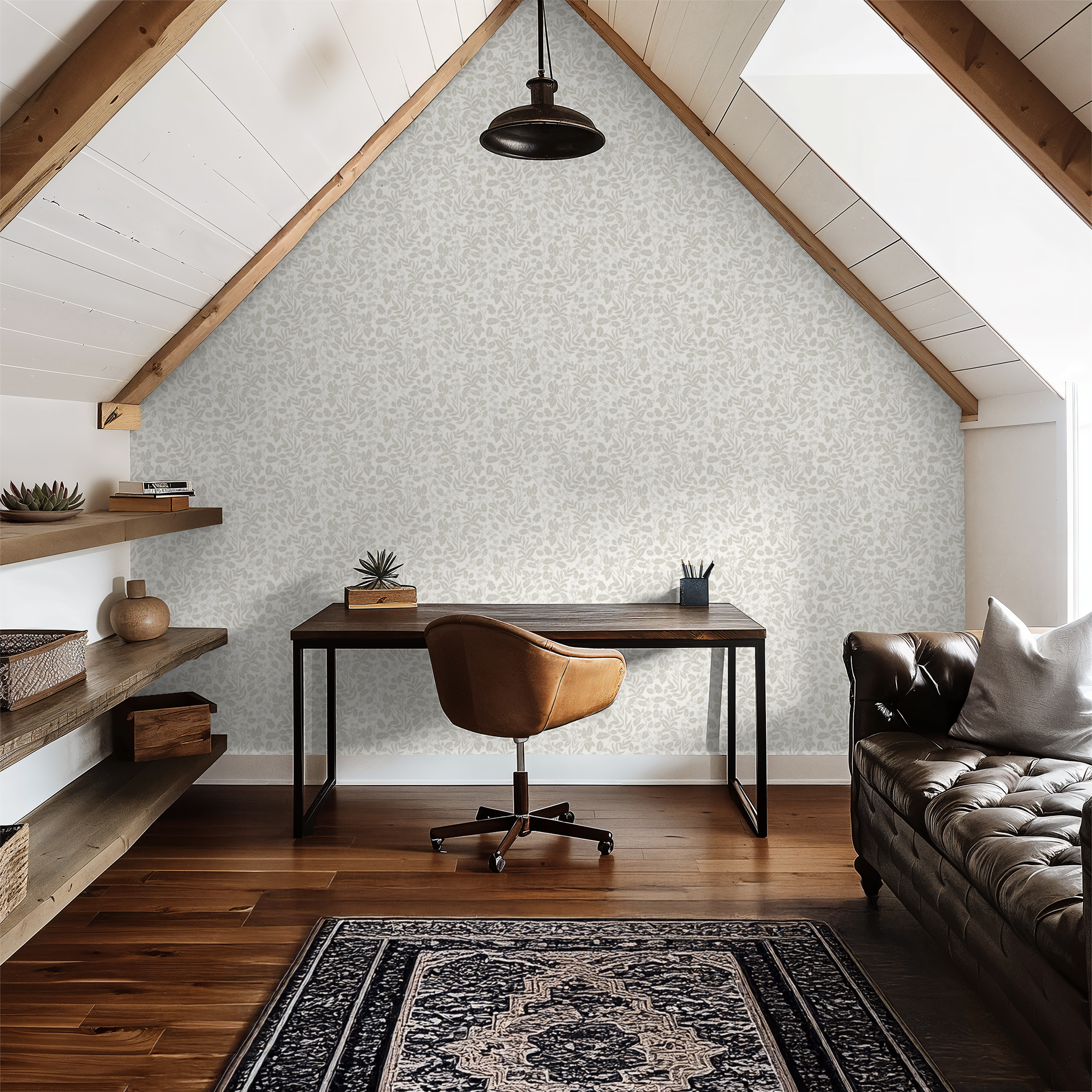 Home office with wooden desk, leather chair, and shelves against a patterned wall.