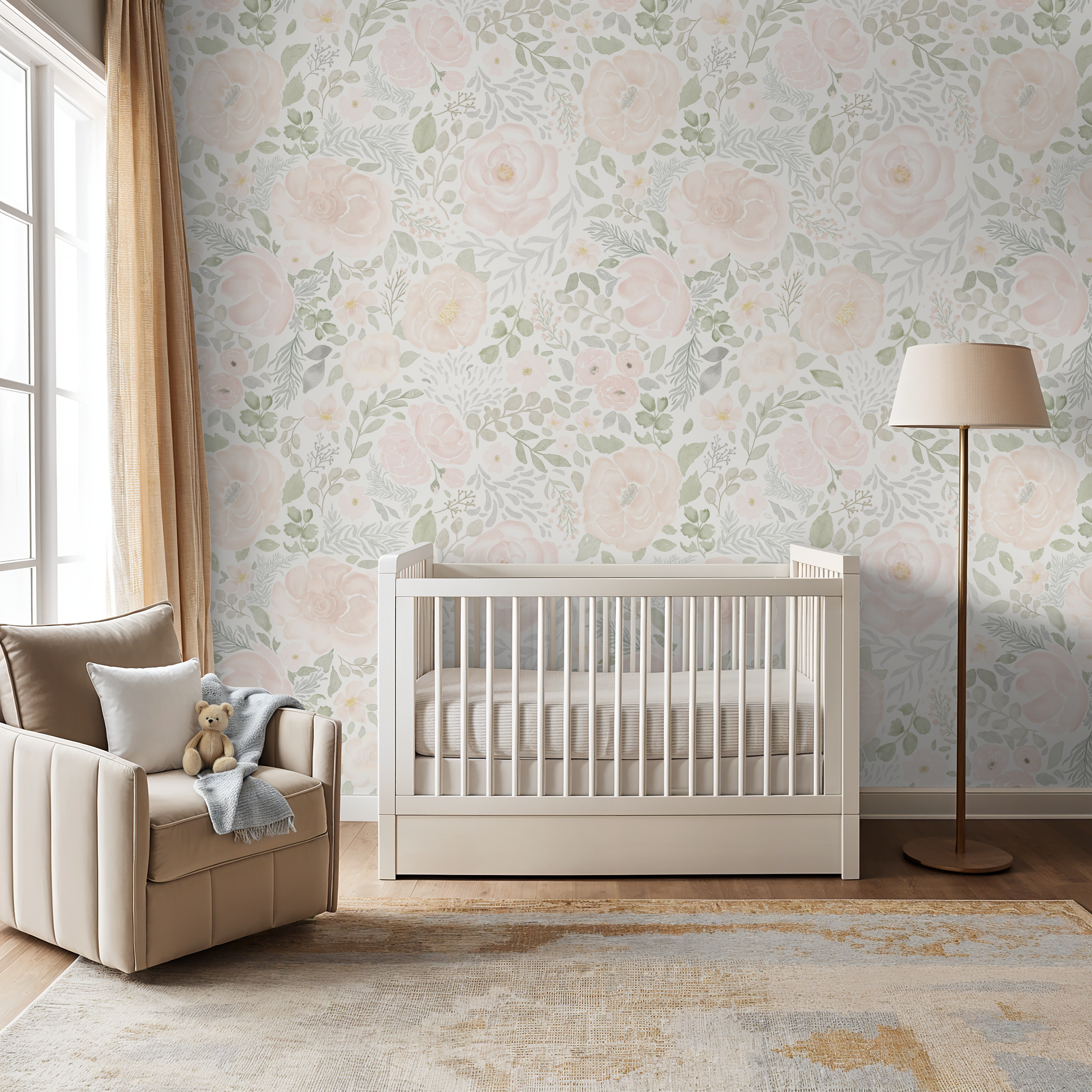 Nursery with full floral mural wall in blush pink and sage green behind a modern white crib and taupe armchair, creating a soft and airy botanical backdrop.