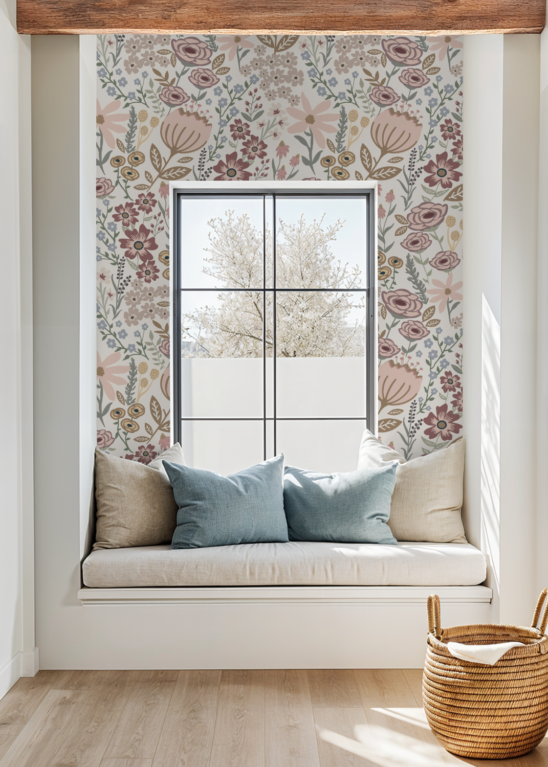 Window seat with floral wallpaper and a wicker basket on a wooden floor.