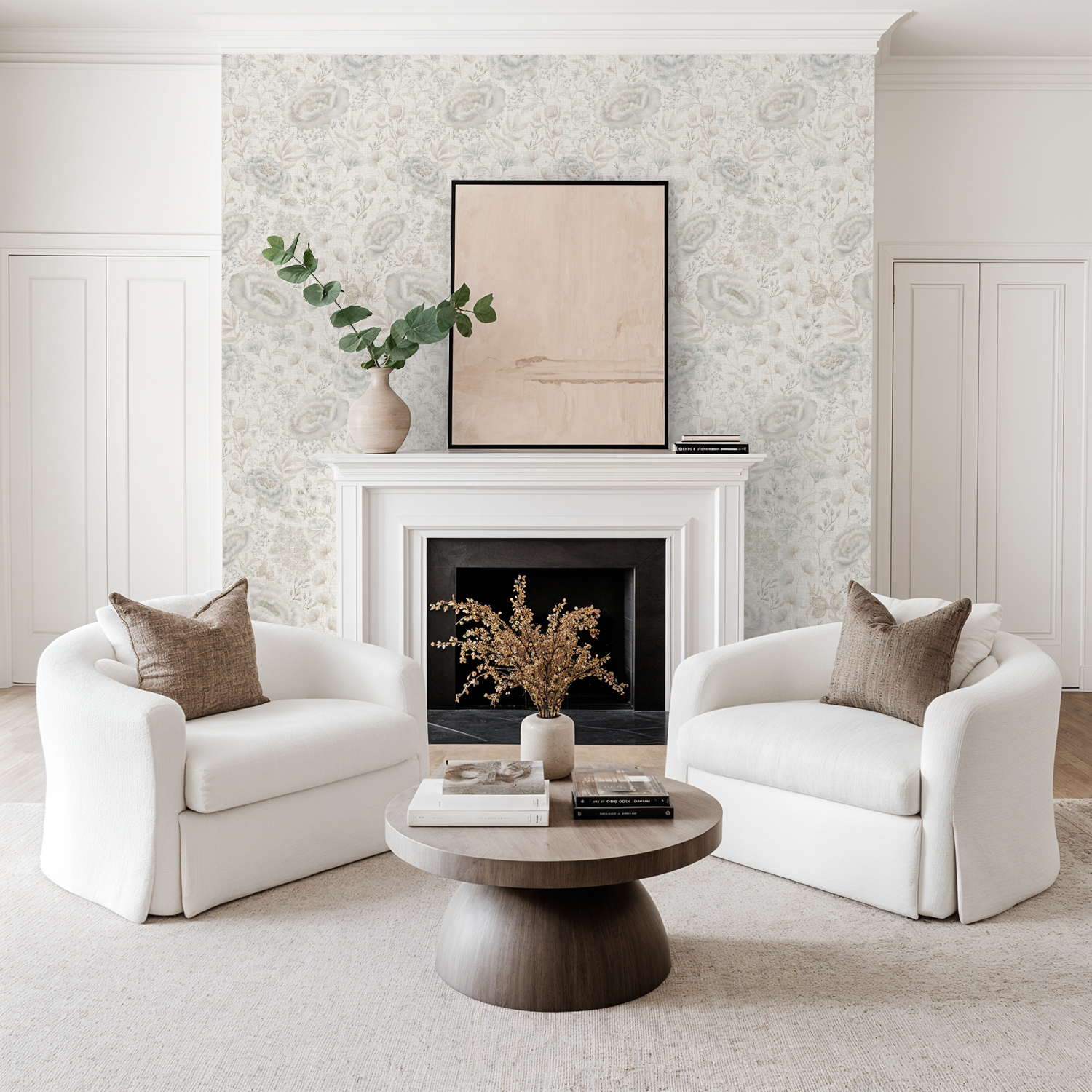Modern living room with white armchairs, a wooden coffee table, and grey floral wallpaper