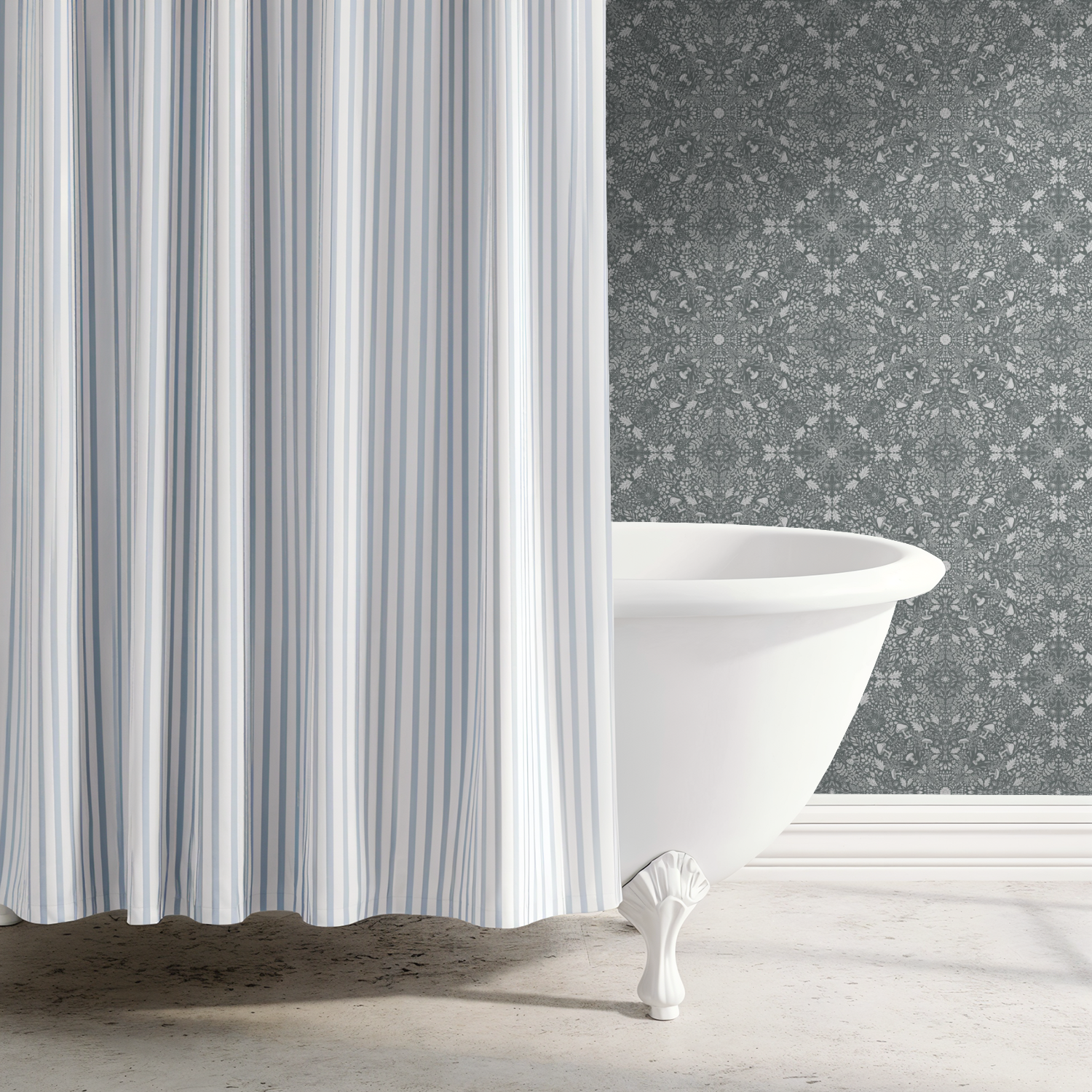 Clawfoot bathtub partially hidden by a striped shower curtain, with Woodland Lace in Blue wallpaper on the wall behind.