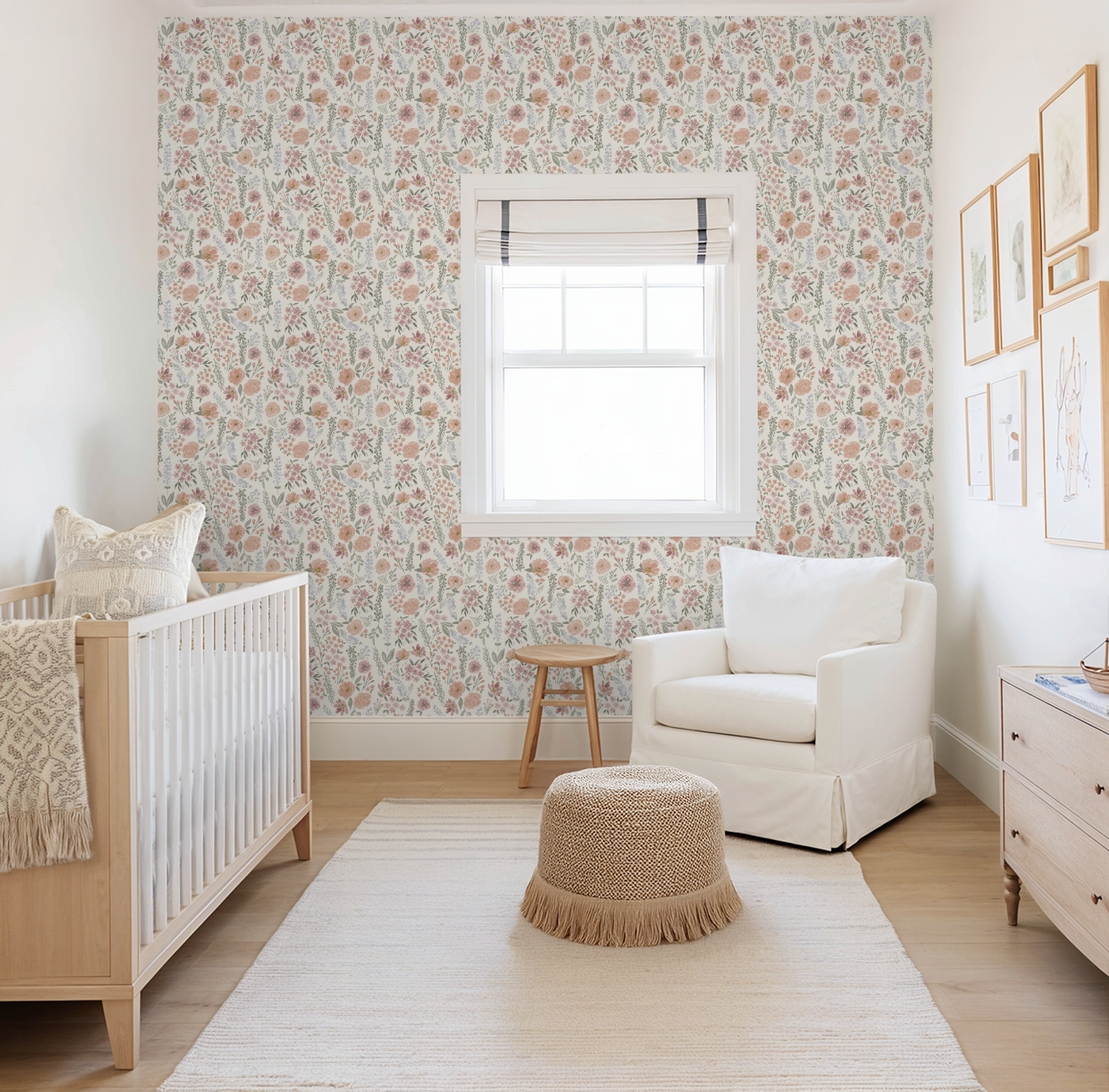 Nursery room with floral wallpaper, crib, chair, and rug.