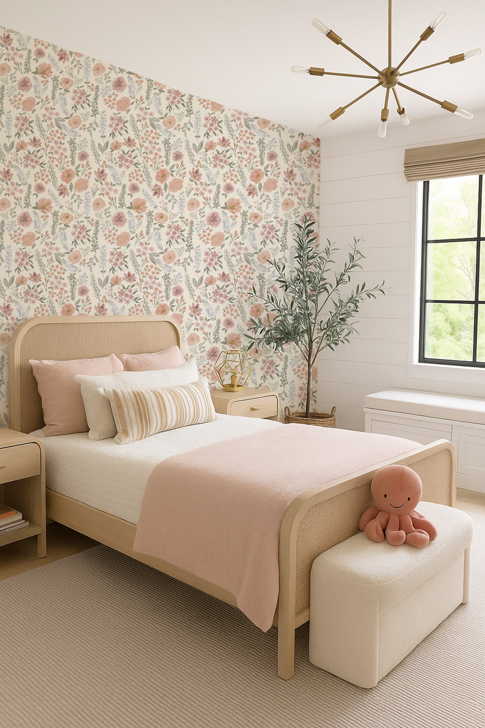 Neatly arranged bedroom with floral wallpaper, a bed, and decorative items.