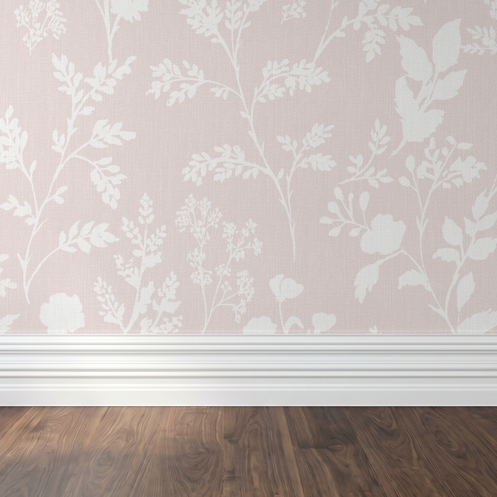Blush wallpaper with white botanical floral pattern in a room with wood floor