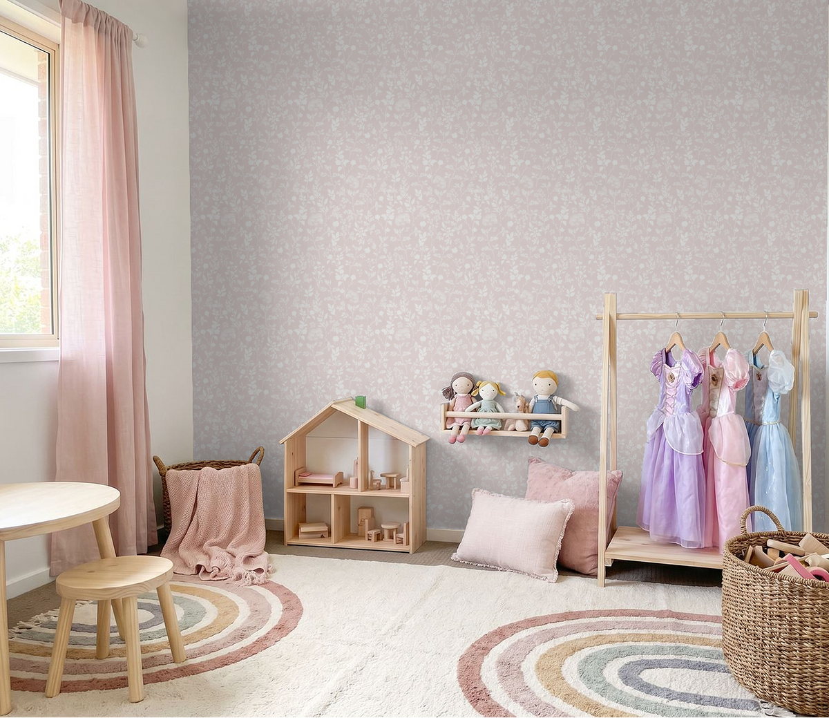 Blush floral wallpaper in a cozy nursery with toys and pastel decor.