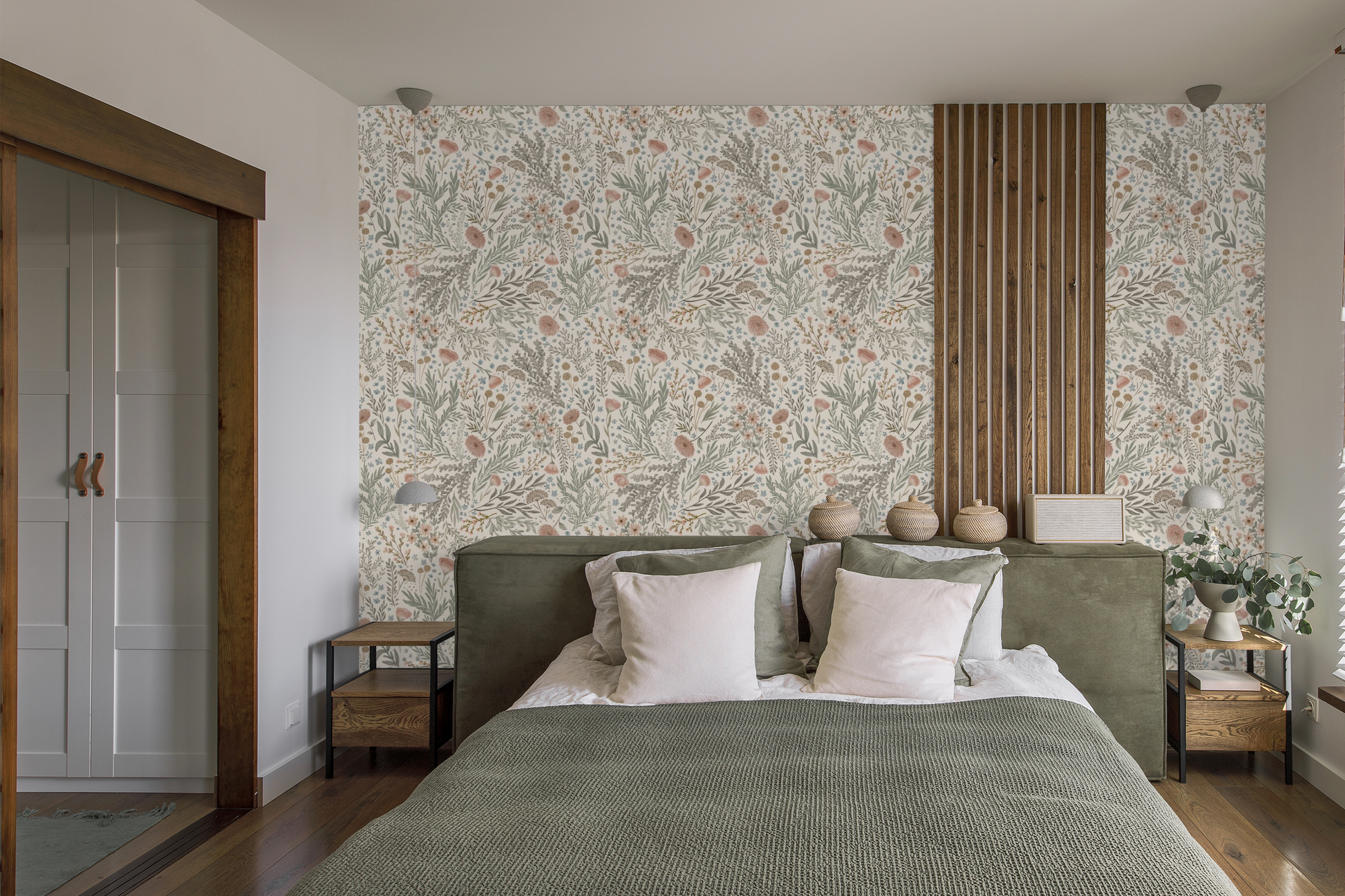 Calming primary bedroom with green bedding and Bronte Woodland Fauna Floral wallpaper bringing soft woodland greenery and blush florals to the space.