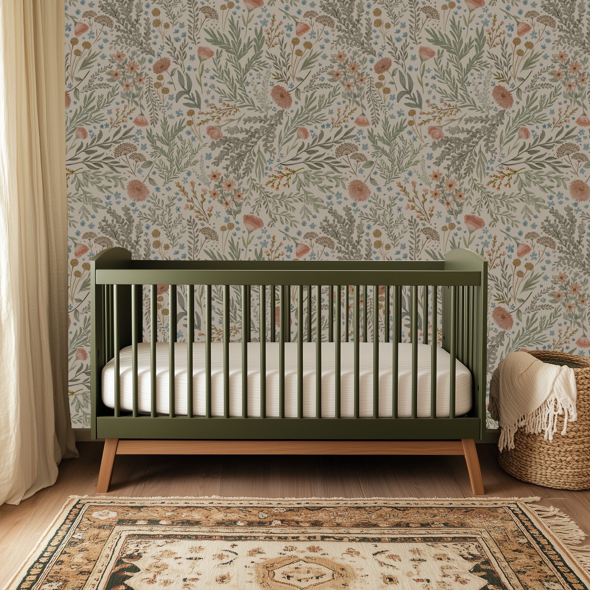 Green crib in a room with floral wallpaper and a patterned rug.