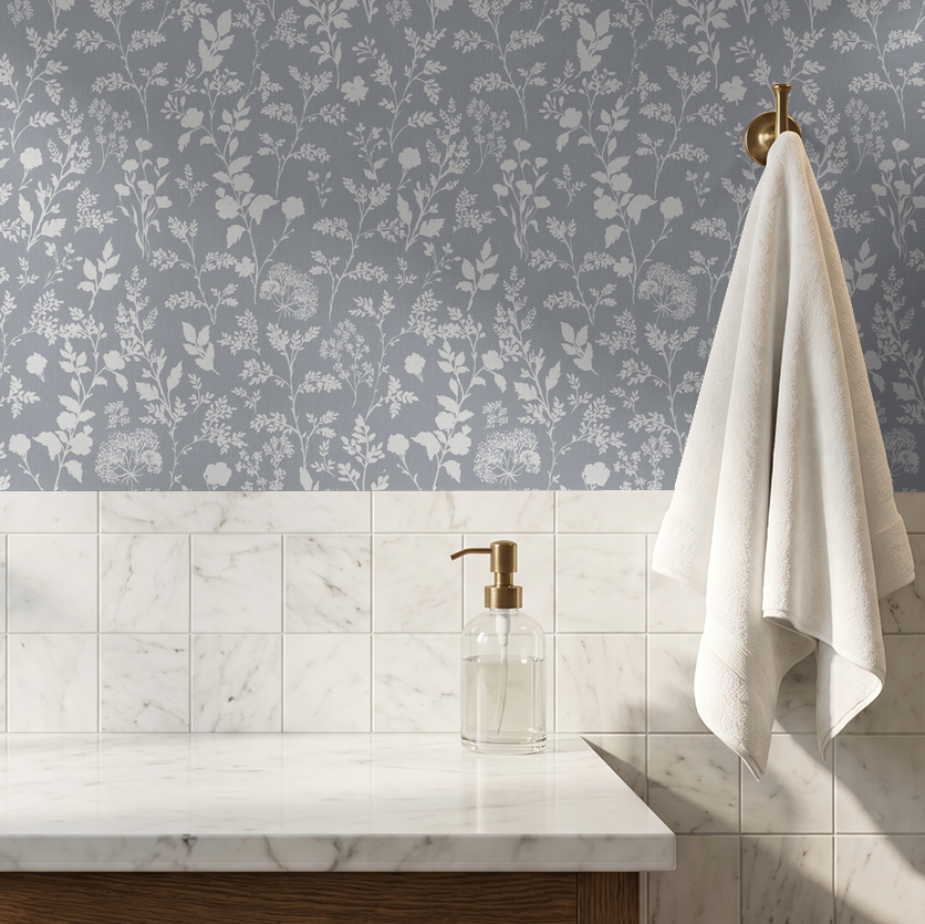 Chambray blue botanical wallpaper with wildflower pattern in bathroom setting.