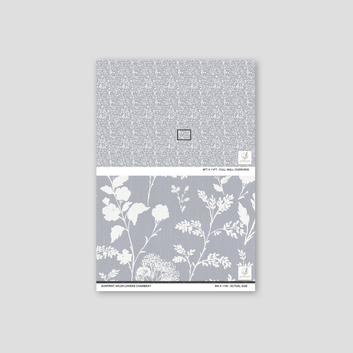 Chambray blue wallpaper with white wildflower silhouettes and leafy stems on textured background.