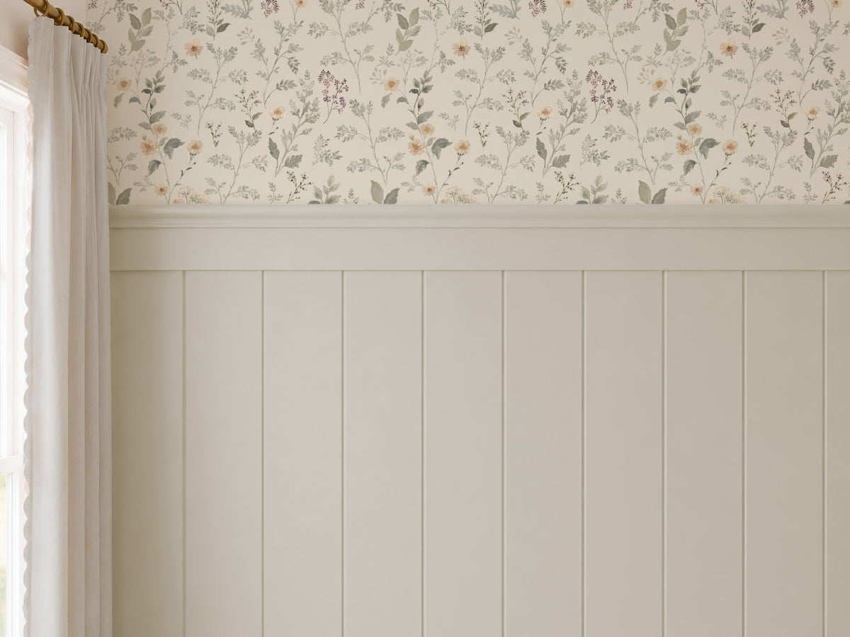 Cream wildflower wallpaper with sage, peach and plum botanicals above traditional wall paneling