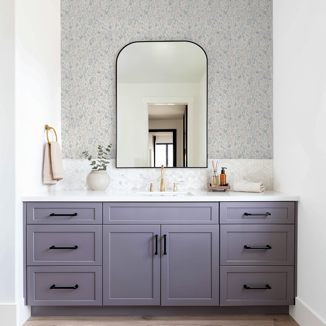 Floral Reef wallpaper with delicate botanical motifs in a modern bathroom setting.