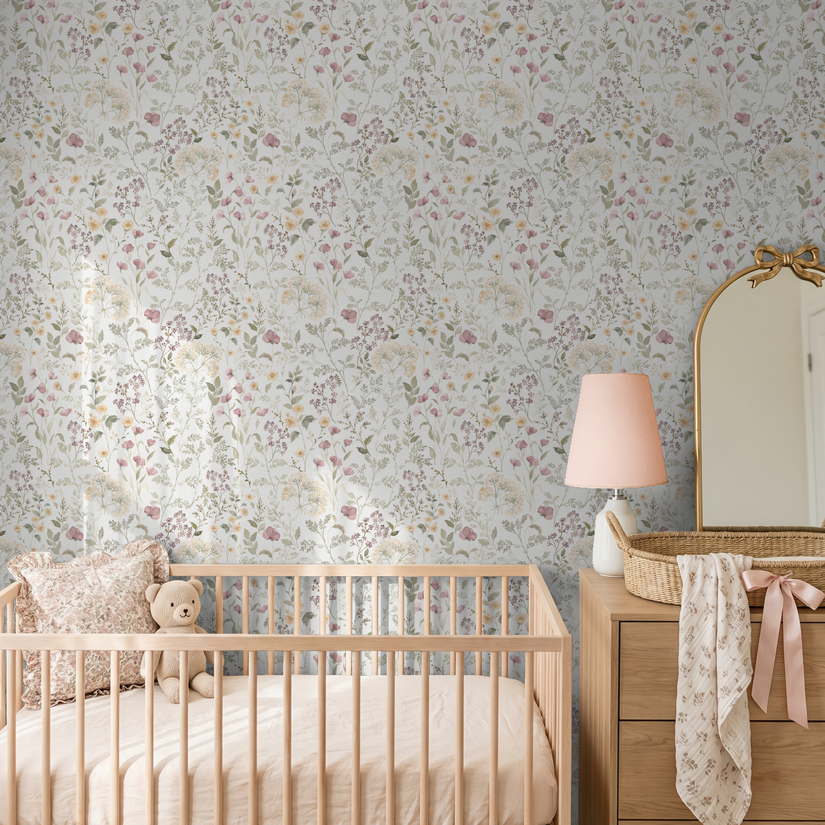 Floral wallpaper with wildflowers in nursery setting, soft colors, wooden crib.