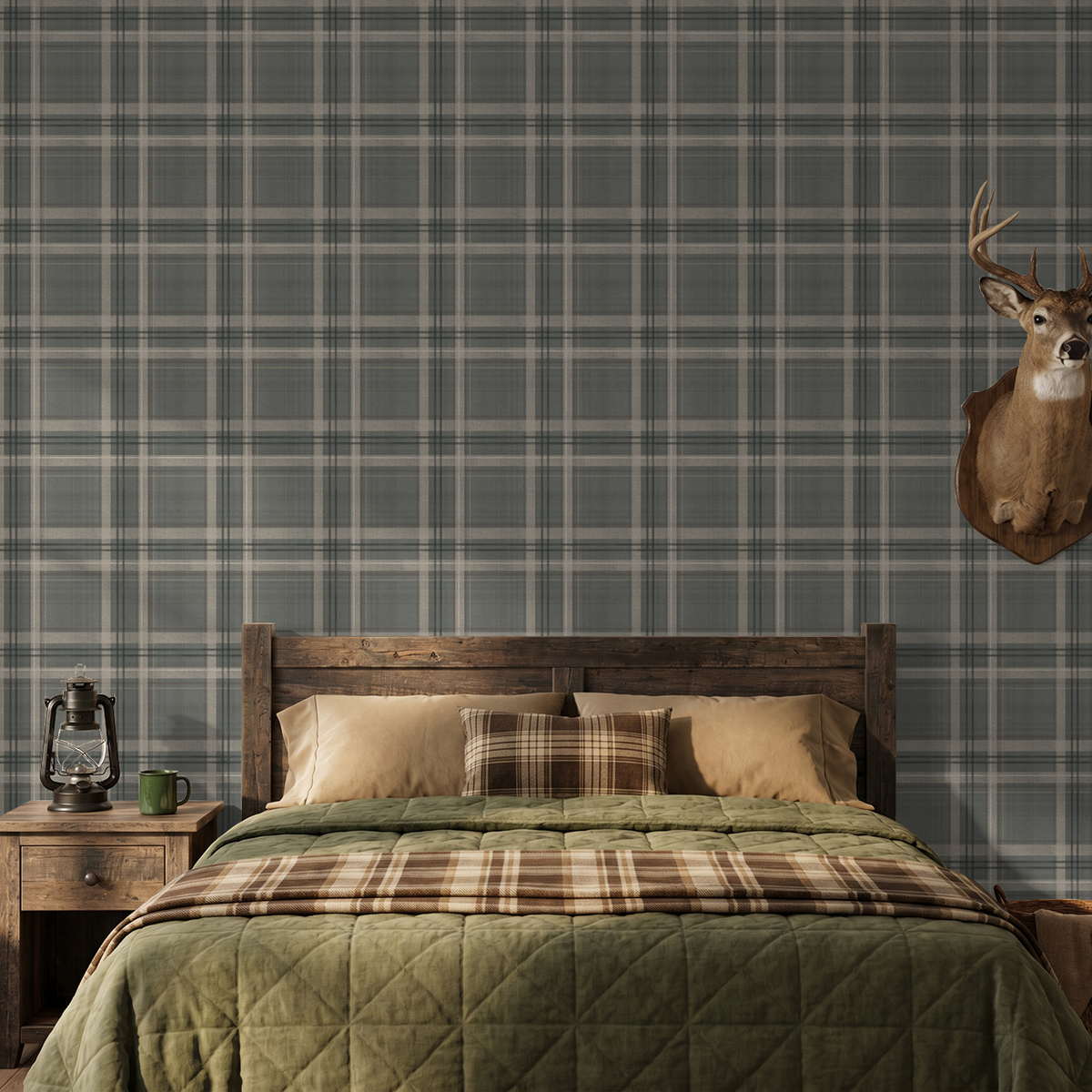 Grey-green Lodge Plaid wallpaper behind a rustic wooden bed with olive bedding and mounted deer head.