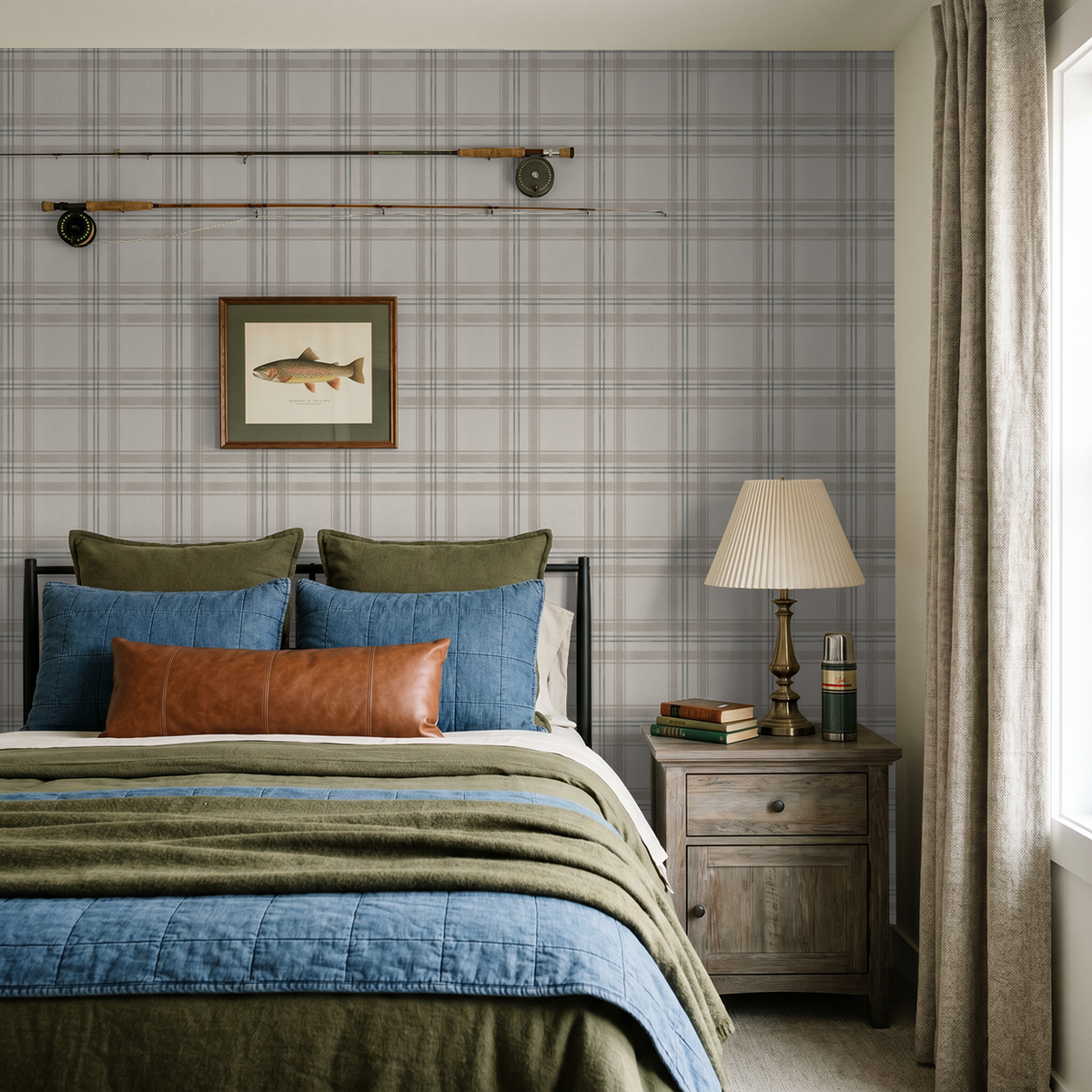 London Plaid green wallpaper in cozy bedroom with fishing decor and rustic furniture.