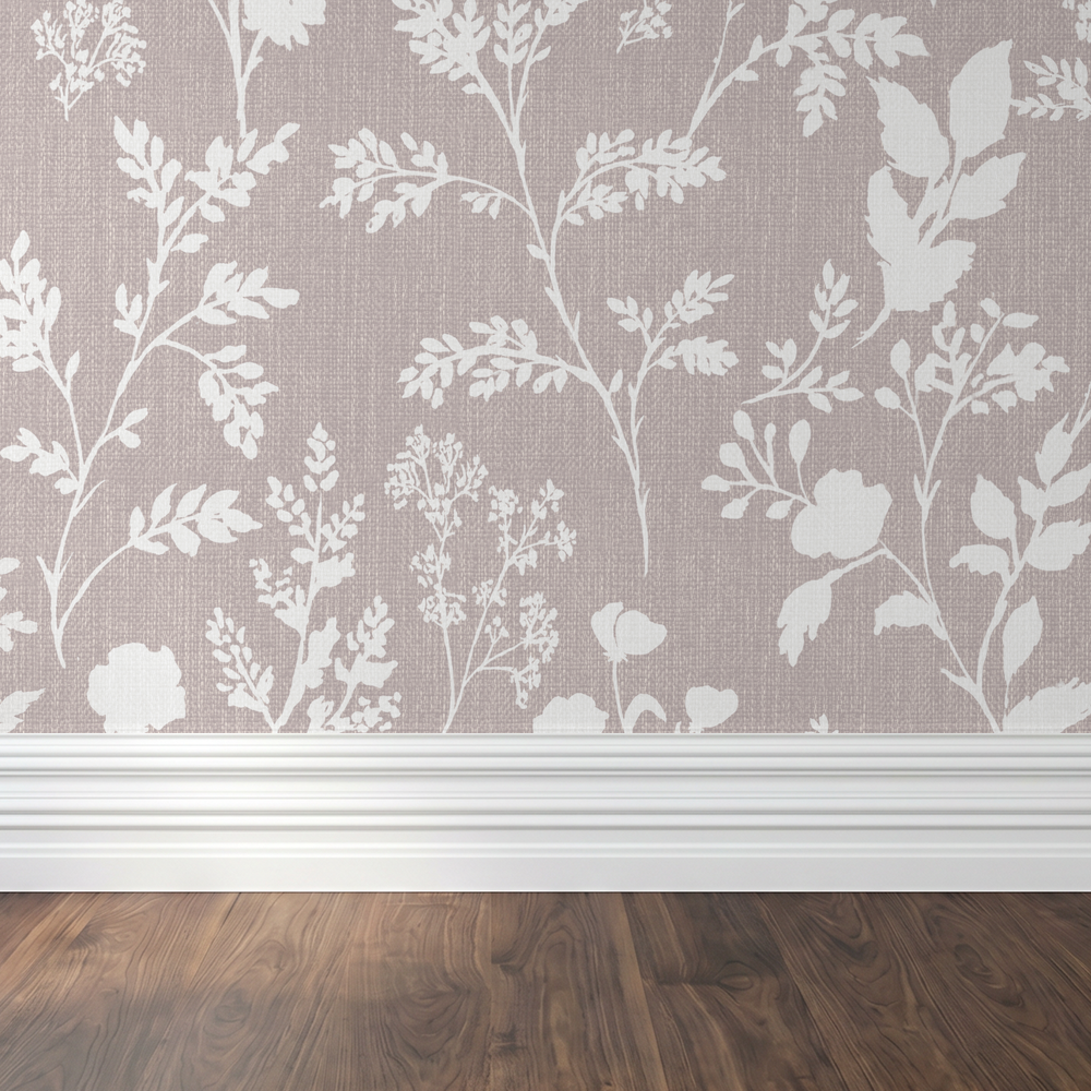 Mauve wallpaper with white botanical silhouettes in a room with wooden floor and white baseboard.