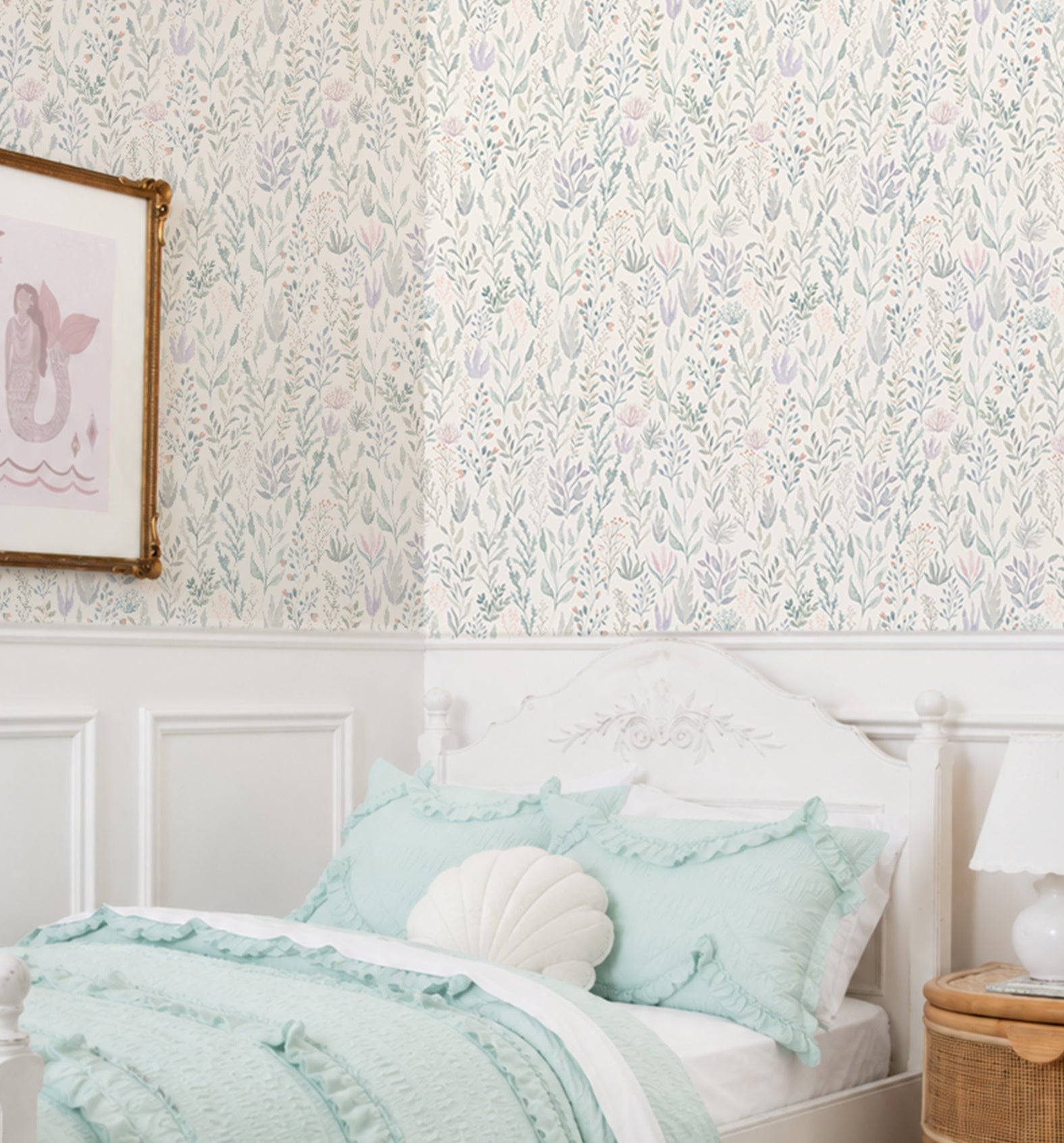 Bedroom with mint green bedding and floral ocean reef  in seafoam and lilac featuring seaweed and corals wallpaper