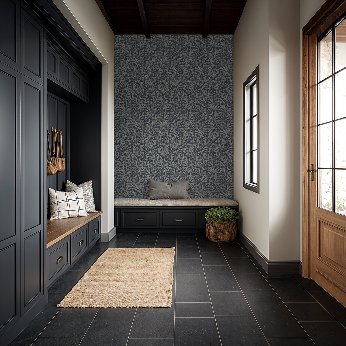 Navy woodland wallpaper in a traditional mudroom with built-in bench and warm wood accents.