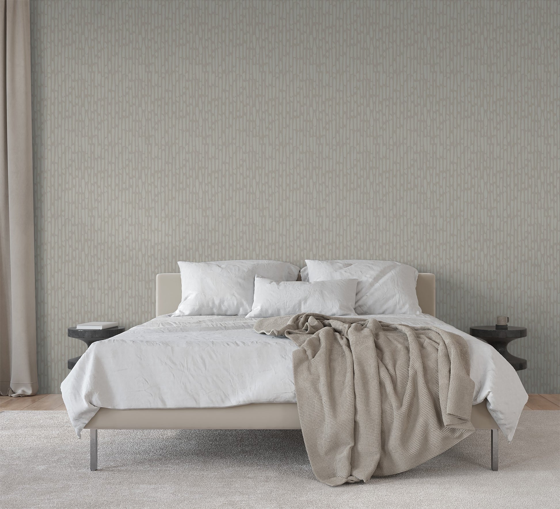 Neutral textured wallpaper in minimalist bedroom with warm layered bedding