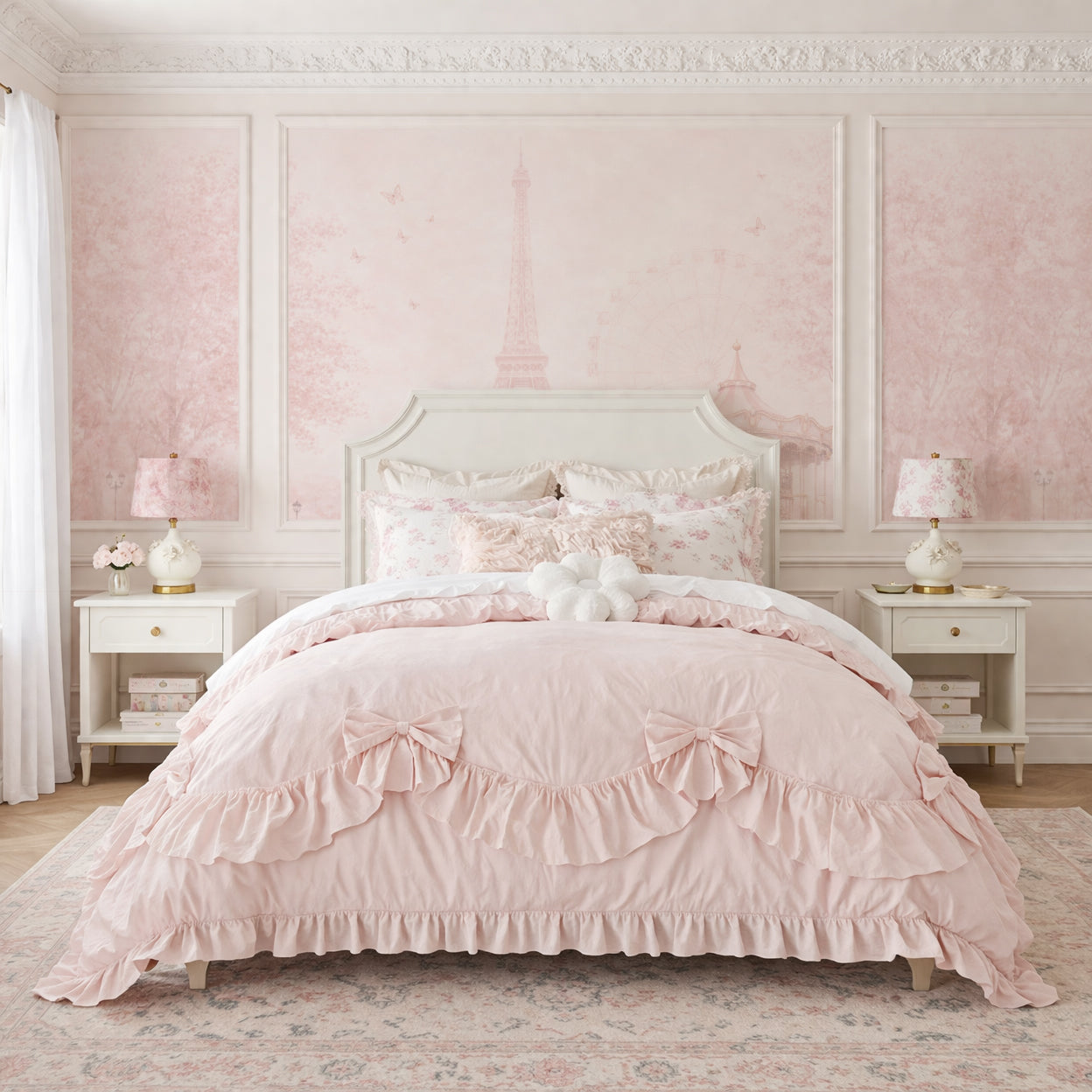 Pink ruffled bedding set on a bed in a stylish bedroom with Parisian Dreamscape wallpaper and white trim.