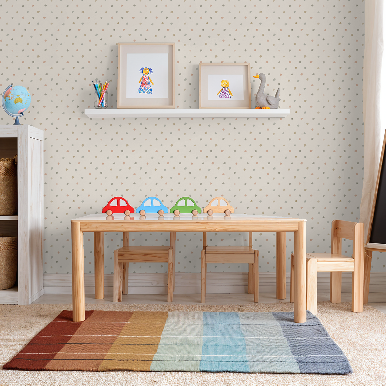 Whimsical pastel dot wallpaper in a cozy kids' playroom with wooden furniture.