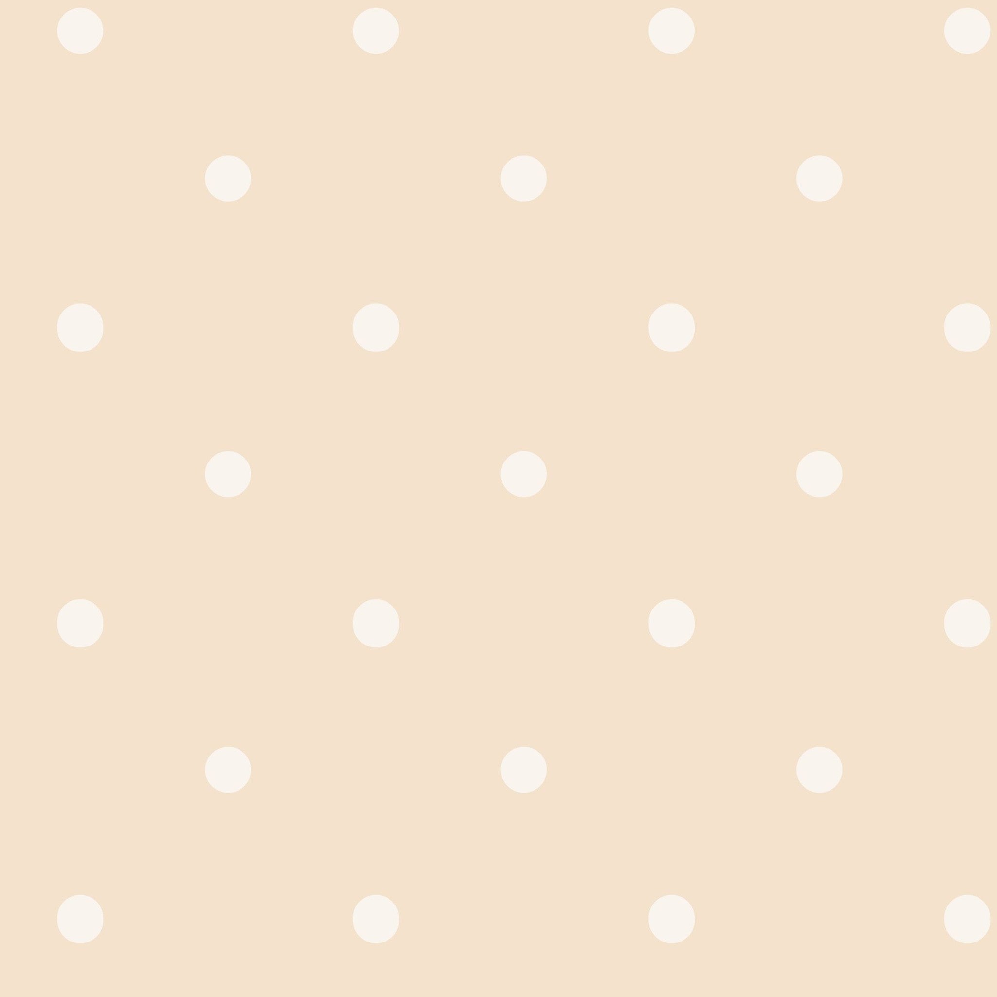 Soft peach wallpaper with white polka dots, minimal and playful design.