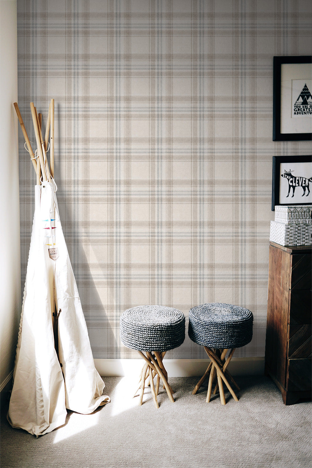 Room interior with Tweed Plaid  – Blue and Taupe wallpaper, teepee, stools, and framed pictures.