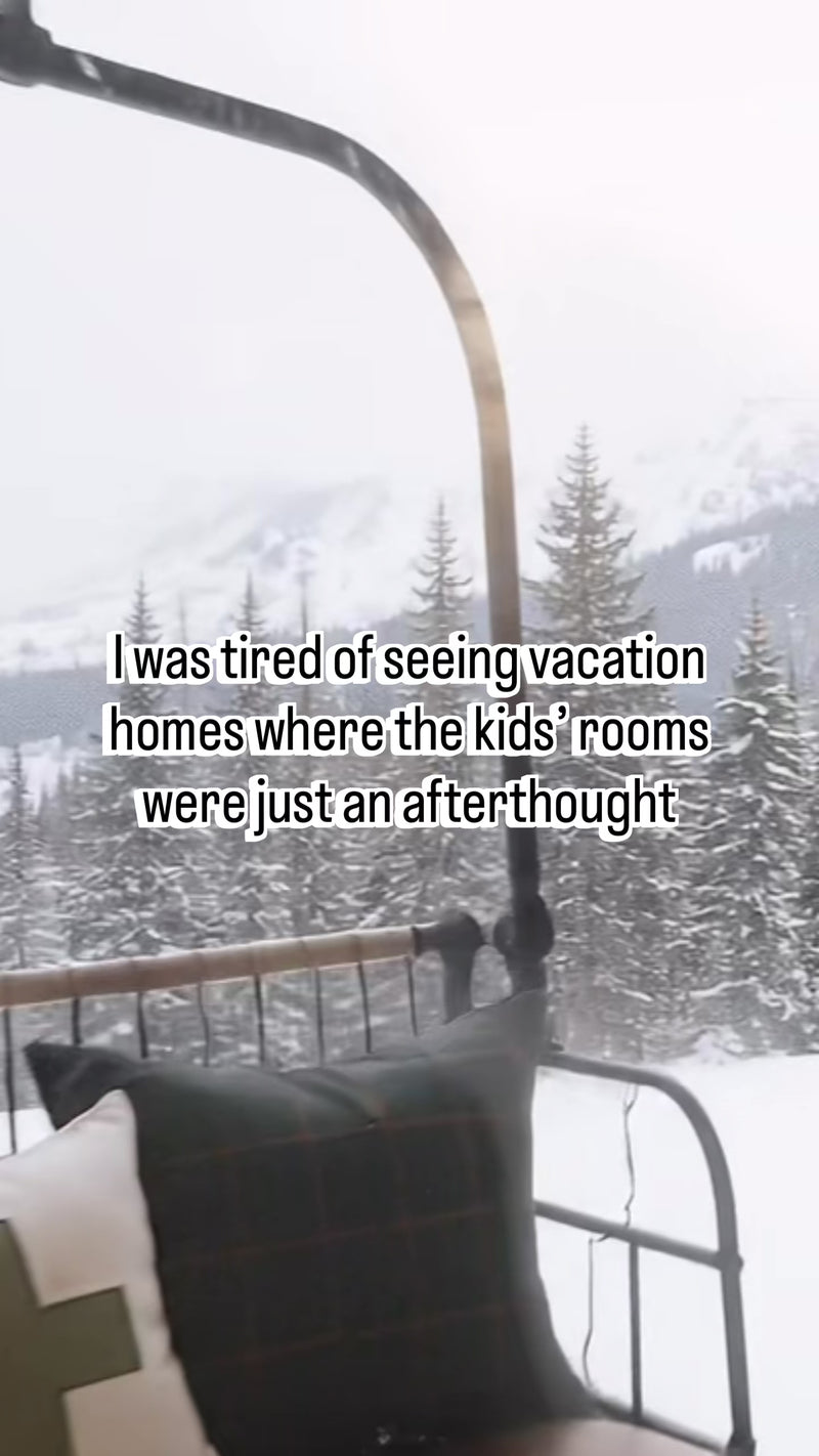 video revealing a dream kids bunk room at a ski lodge with a large ski mural in wallpaper, a alpine play house and a chair lift swing