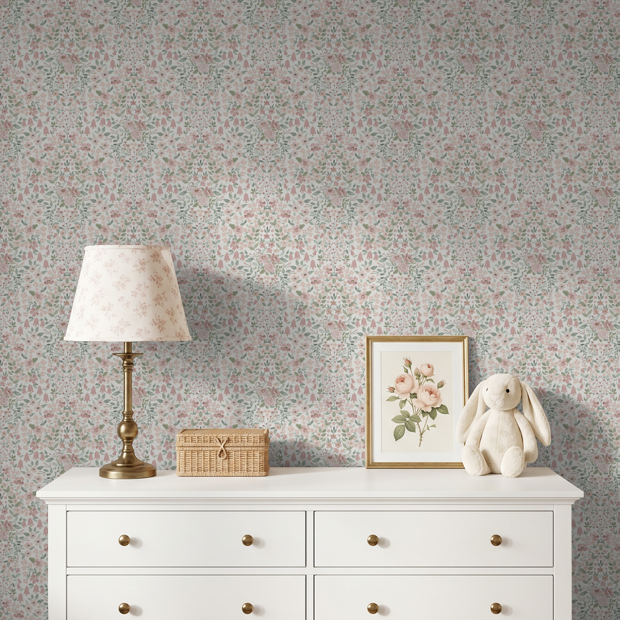 Cozy nursery featuring romantic floral wallpaper, vintage lamp, and soft blush decor.