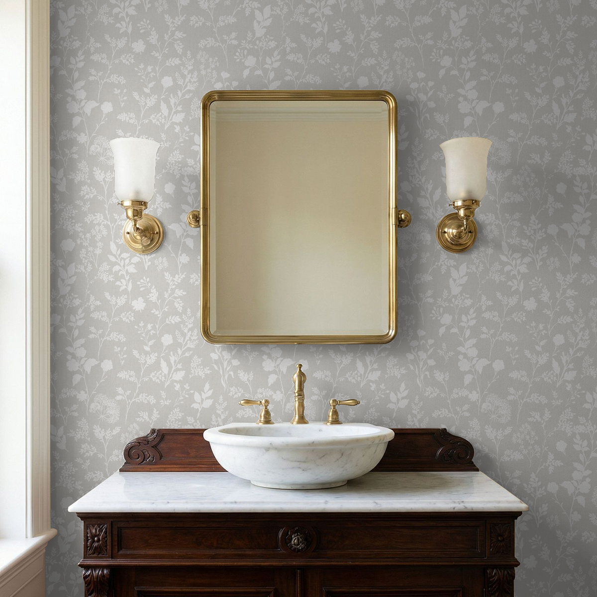 Sunprint wildflowers linen wallpaper in elegant bathroom with gold fixtures.