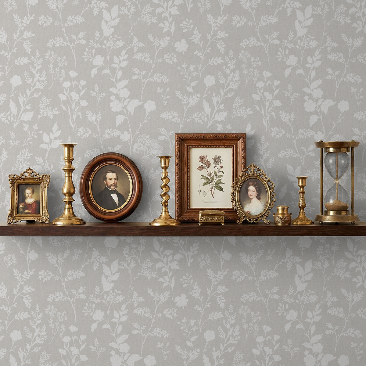 Sunprint Wildflowers Linen wallpaper with delicate floral pattern in neutral tones behind a shelf with vintage decor.