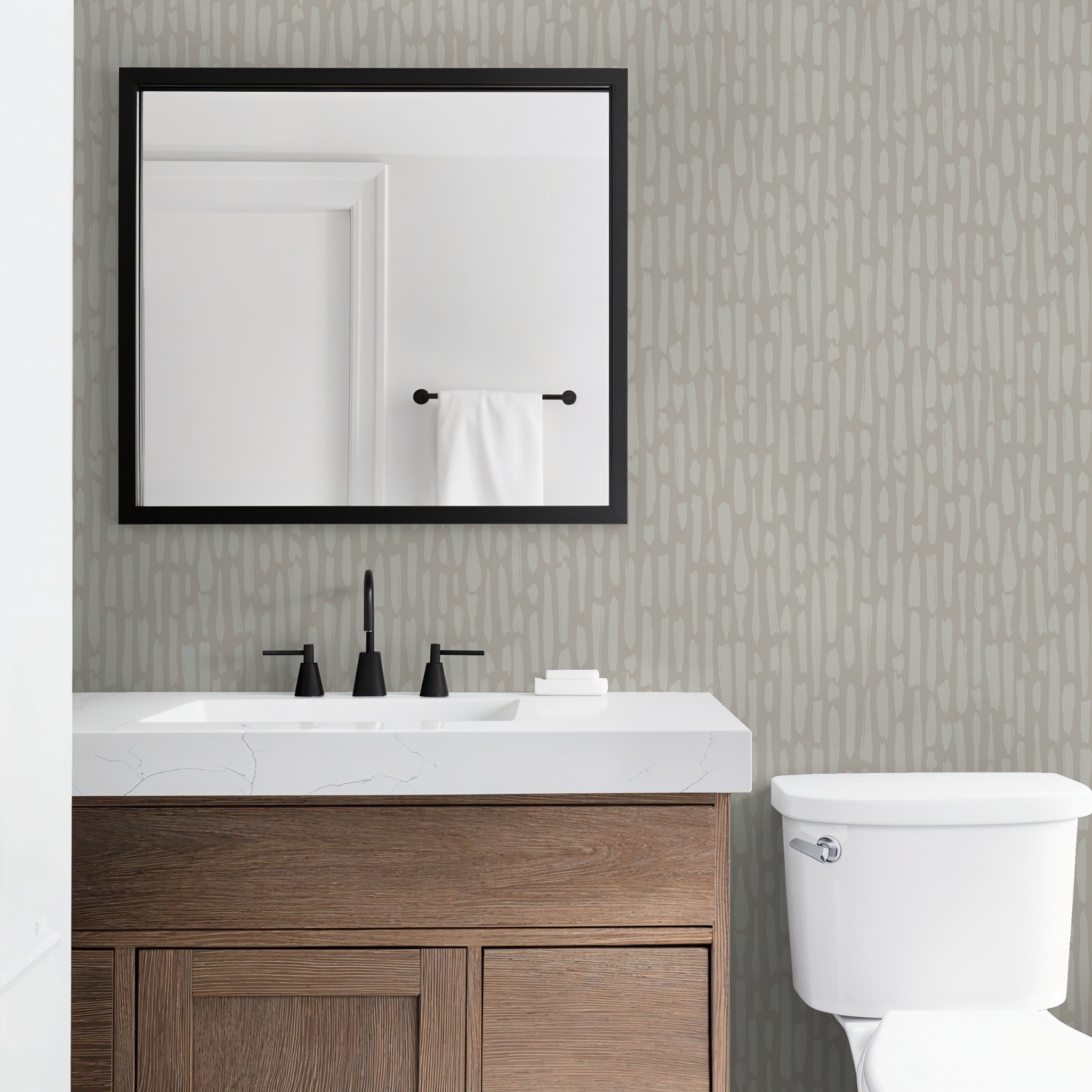 Tone-on-tone brushstroke wallpaper in modern bathroom with warm wood vanity